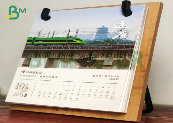 달력 페이지를 위한 150gsm 200gsm 광택이 나는 쿠체 신문은 인쇄하는 것 오프셋시켰습니다
